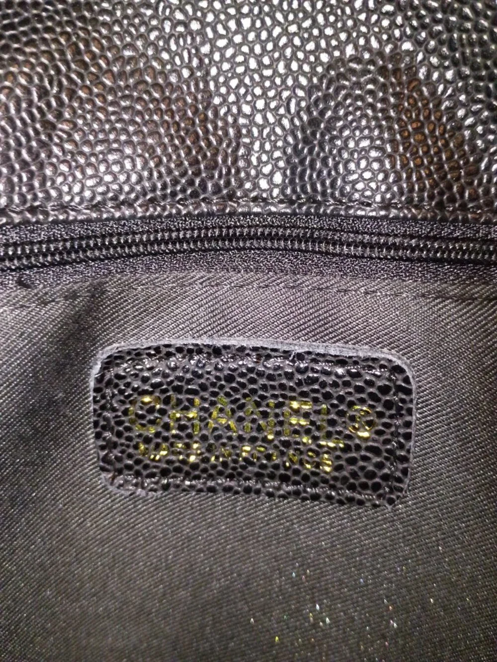 Authentic CHANEL discontinued gst black caviar leather with gold hardware